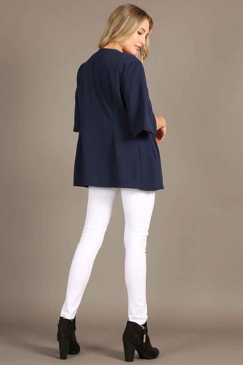 1245 Solid open coat with slit sleeves and a loose fit.