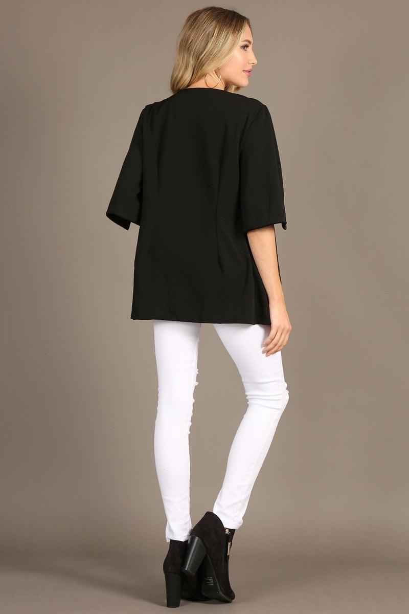 1245 Solid open coat with slit sleeves and a loose fit.